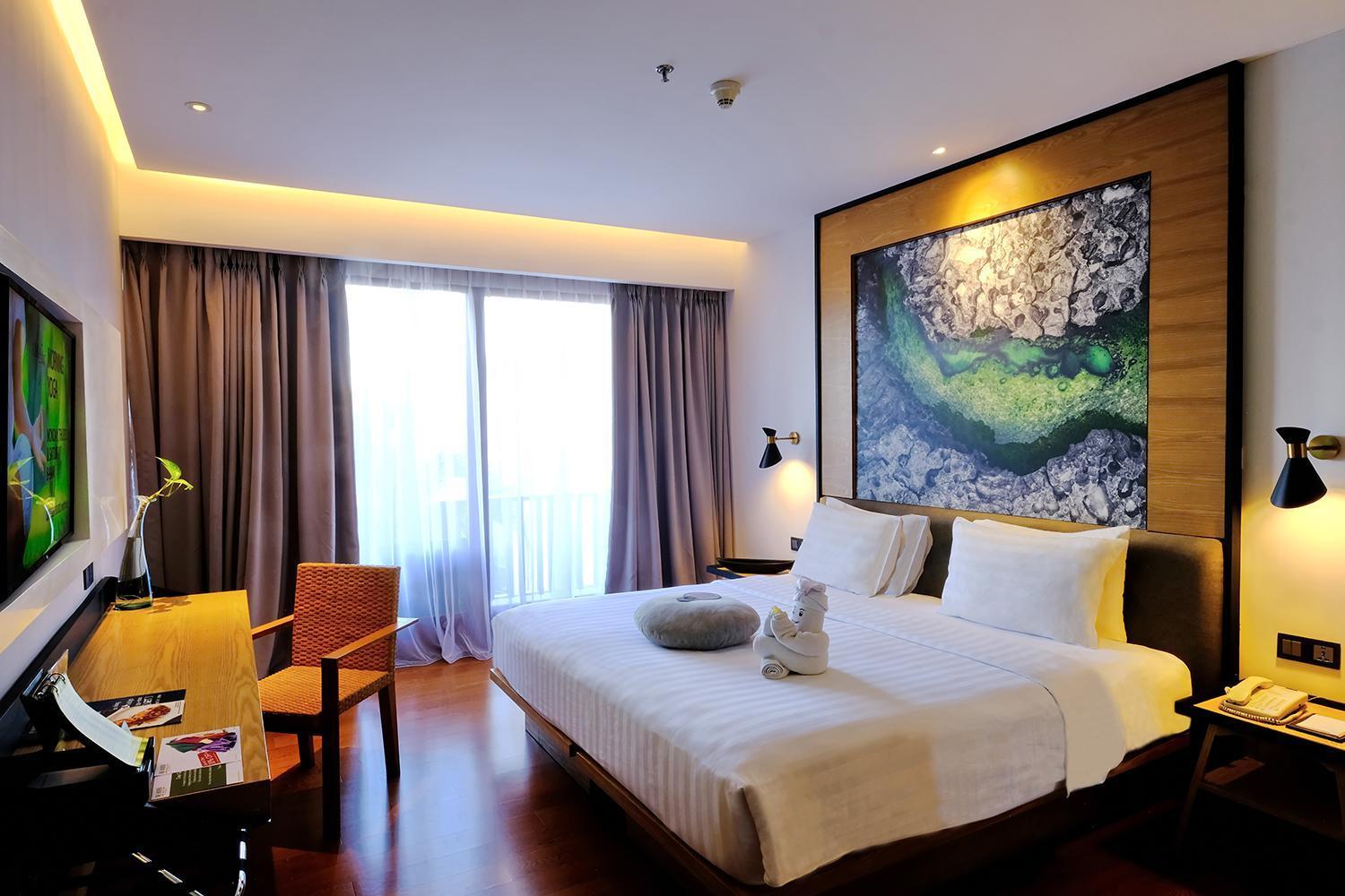 Chambre Premier Haven avec Balcon - Vue sur Piscine